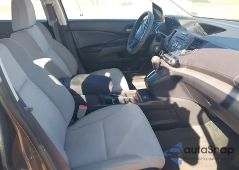 2016 Honda Cr-V Lx z USA, uszkodzony, nr VIN 5J6RM4H34GL128357